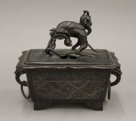 A 17th/18th century Chinese bronze censer and cover of rectangular form,