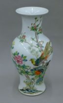 A Chinese Republic period porcelain vase decorated with birds amongst flowers,