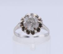 An 18 ct white gold diamond solitaire ring. The claw set stone approximately 1.30 carats.