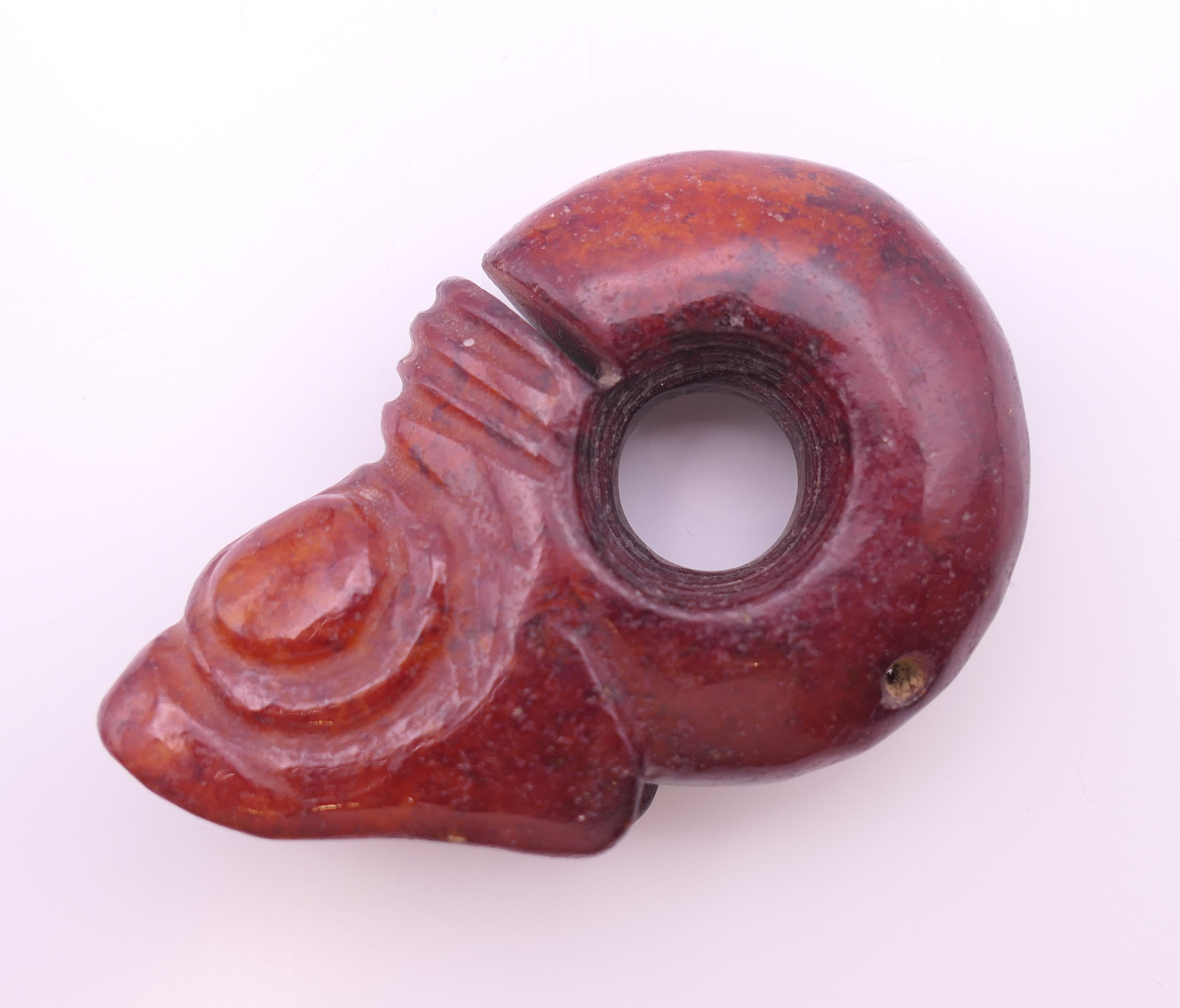 A Chinese red jade pig dragon, early Hongshan Culture. 6 cm long. - Image 2 of 6