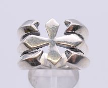 A silver cross ring. Ring size S/T.