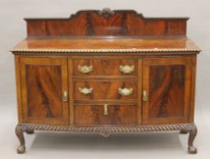 An Edwardian mahogany sideboard. 155 cm wide.