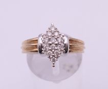 A 9 K gold 0.25 carat diamond cluster ring. Ring size N. 5.7 grammes total weight.