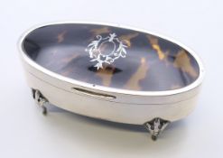 A silver and tortoiseshell trinket box, hallmarked for London 1927. 11 cm x 6 cm.