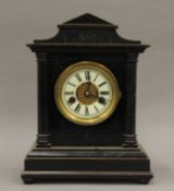 A fourteen-day H.A.C striking clock. 33 cm high.
