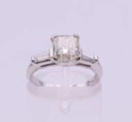 A platinum radiant cut diamond ring. Diamond weight approximately 1.70 carats. Ring size J/K. 4.