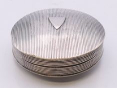 A Dutch silver pill box. 5 cm diameter. 24.8 grammes.