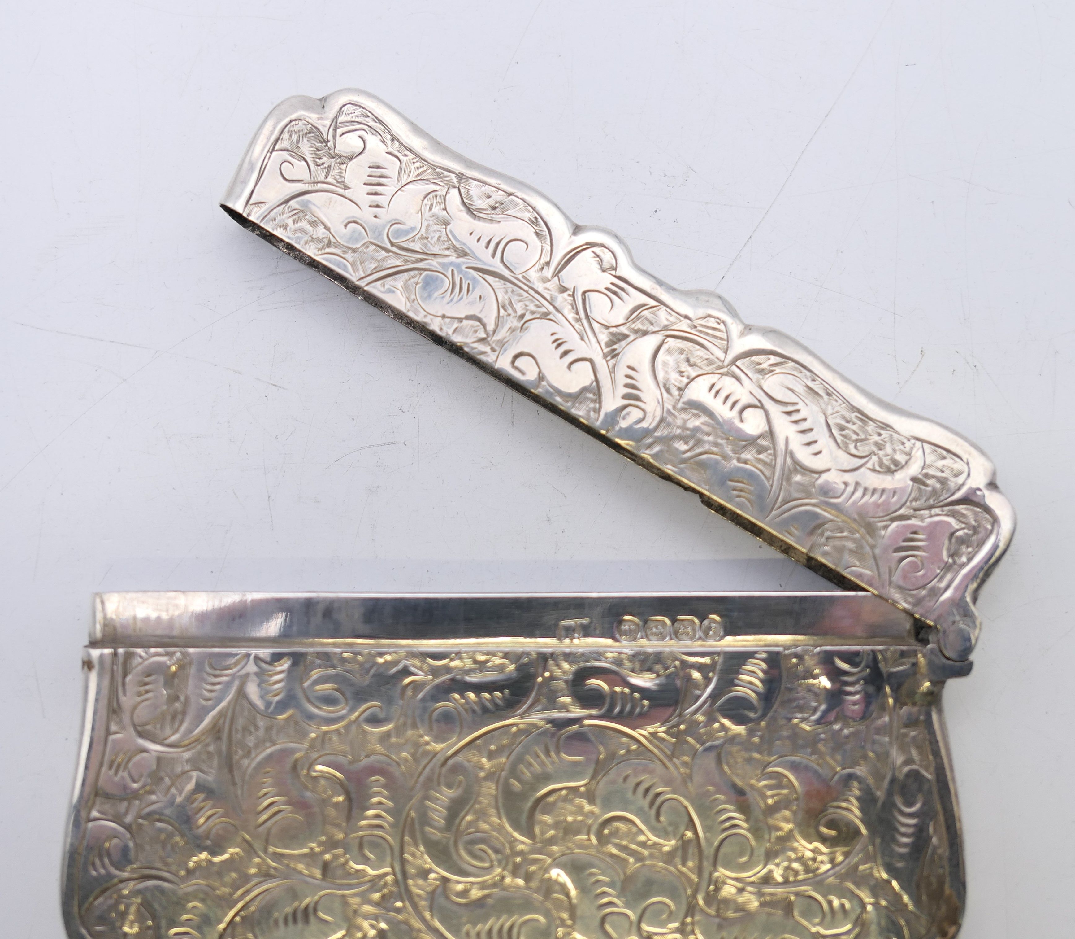 A silver card case, hallmarked for Birmingham 1886. 10 cm x 7 cm. 49.2 grammes. - Image 6 of 7