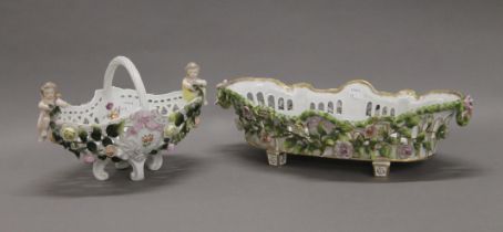A pair of Sitzendorf porcelain florally encrusted baskets. The largest 41 cm wide.