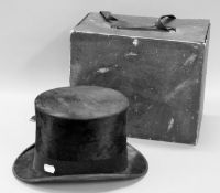 A boxed top hat by Barber & Company.