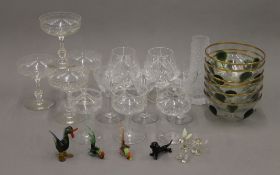 A quantity of glassware, including glass animals.