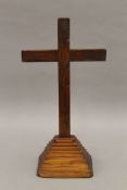 A scratch built wooden cross. 29 cm high.