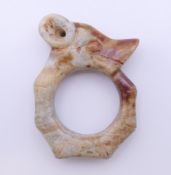 A Chinese white and red jade animal head pendent, Han Dynasty. 6 cm high.