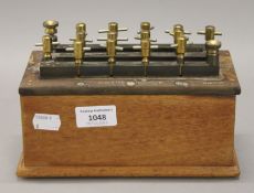 A Baird and Tatlock electrical calibrator. 21.5 cm long.