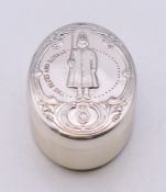 A silver box, the lid decorated with a soldier of The Blues and Royal's. 5.5 cm x 3.5 cm.