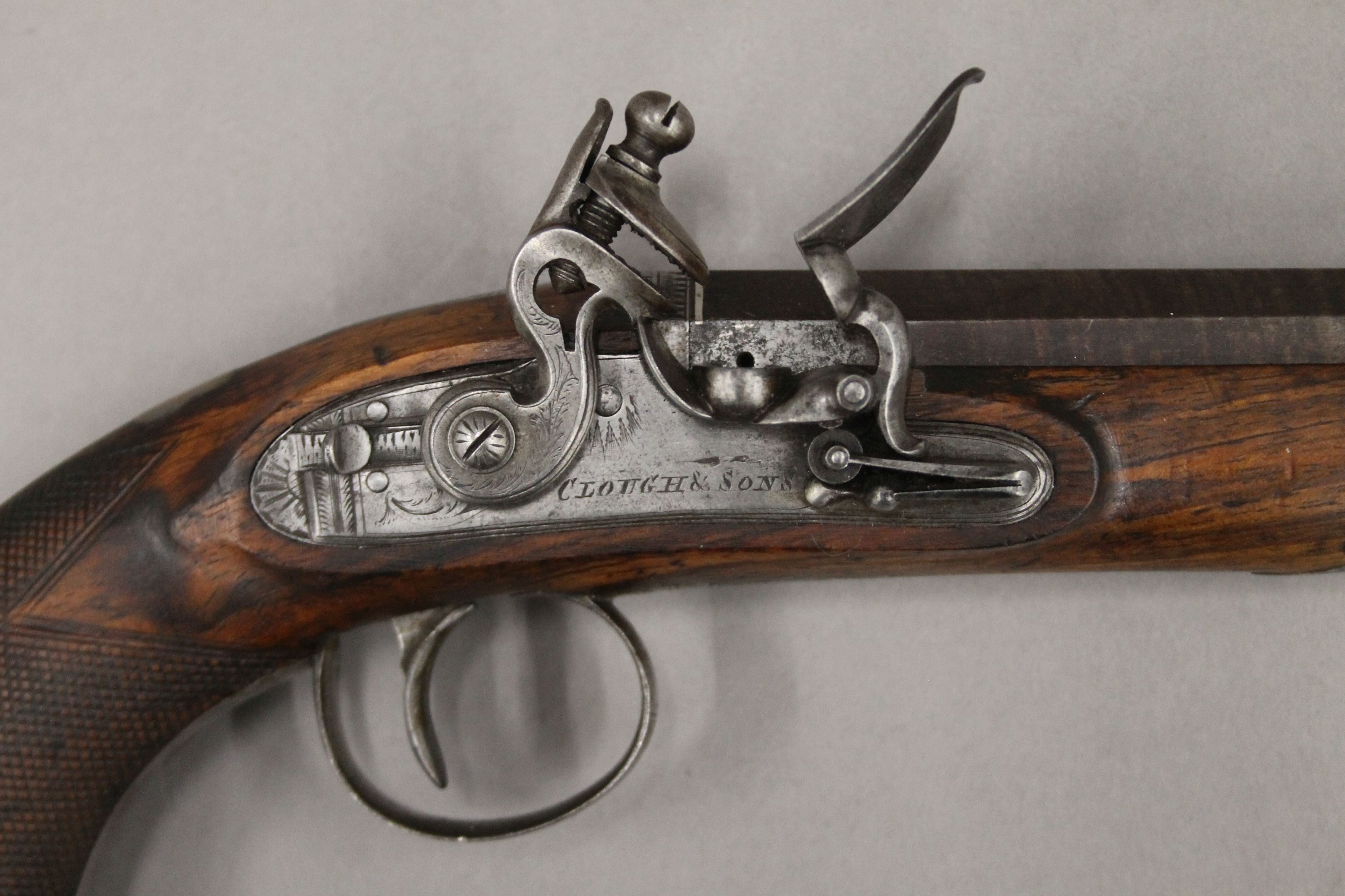 A pair of flintlock pistols by Clough & Sons. 27 cm long. - Image 3 of 10