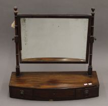 A 19th century mahogany three drawer toilet mirror. 67 cm wide.