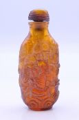 A snuff bottle. 8 cm high.