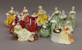 A collection of Royal Doulton figurines. The largest approximately 20 cm high.