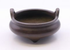A small bronze censer. 6 cm diameter.