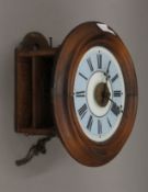 A Victorian postman's alarm clock with blue dial. 28 cm diameter.