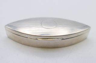 A silver pill box, hallmarked for Birmingham 1920. 8 cm x 3.5 cm. 31.6 grammes.