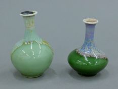 Two small Chinese green ground porcelain vases. The largest 8 cm high.