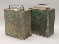 Two petrol cans - Flight and Pratts. Each 32 cm high.
