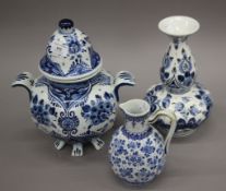 Three pieces of Delft ware. The largest 28 cm high.