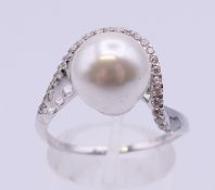 A silver dress ring. Ring size S/T.