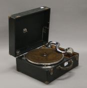 A vintage portable gramophone. 33.5 cm long.