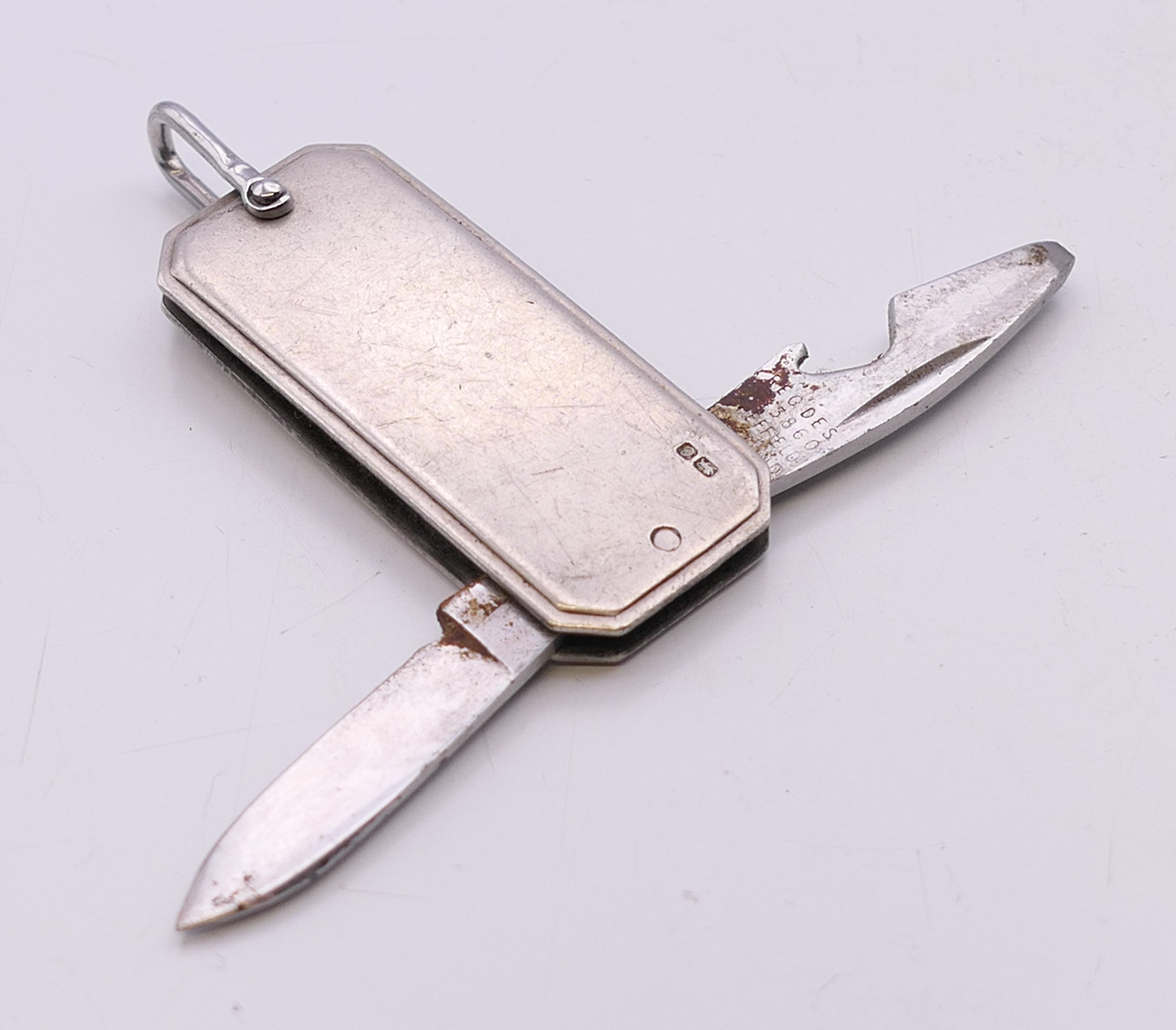 A silver cased penknife. 4.5 cm x 2 cm. 26 grammes total weight. - Image 3 of 4