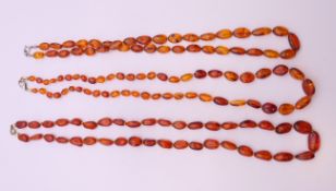 Three bead necklaces. The largest 60 cm long.