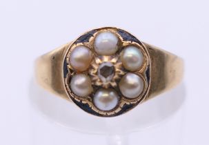 A Victorian 18 ct gold seed pearl and rose diamond ring, hallmarked for Birmingham 1863.