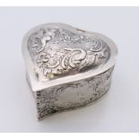 A silver heart shaped pill box, import marks for London 1897. 5.5 cm wide. 58.3 grammes.