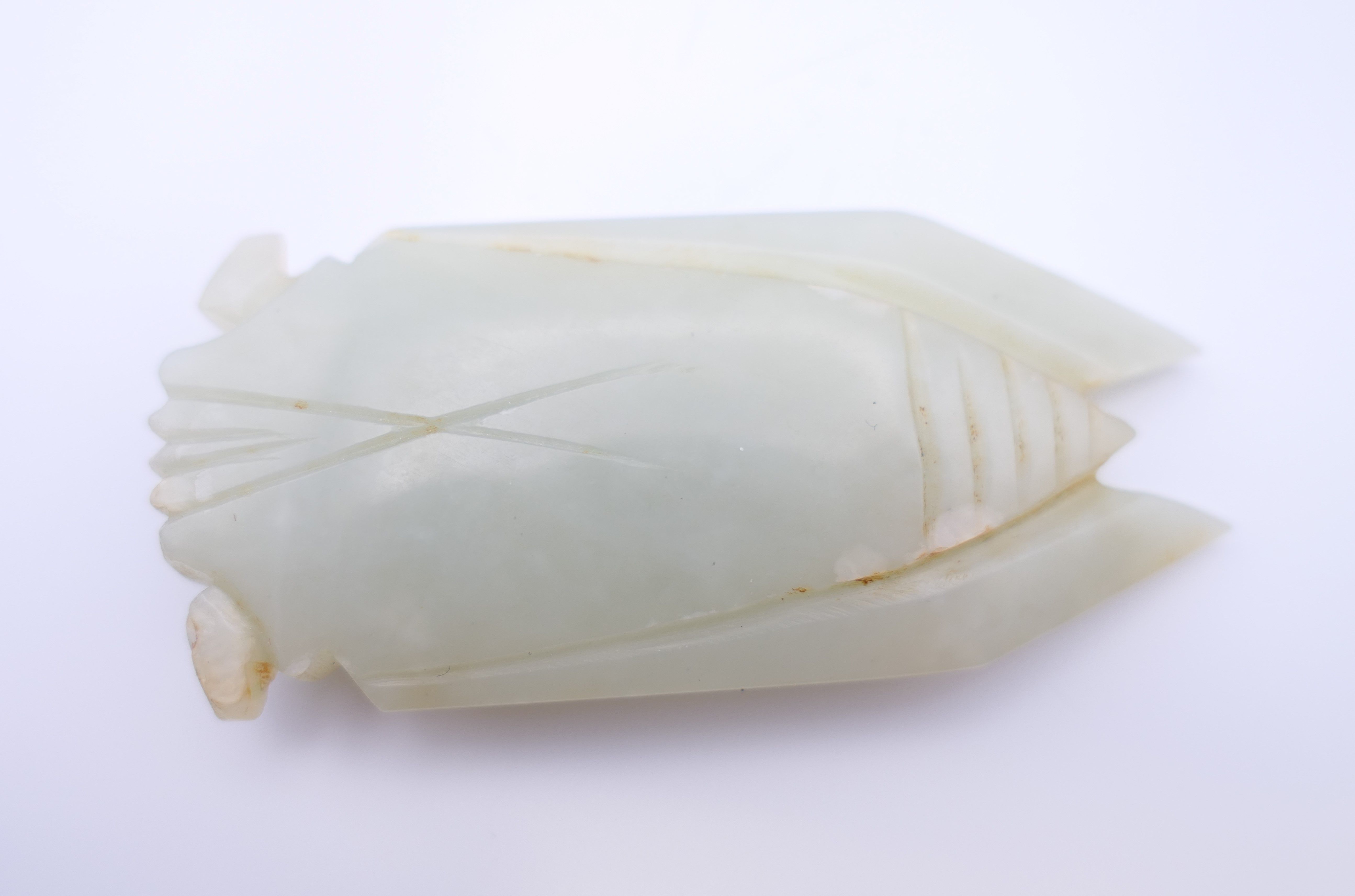 A Chinese light green jade cicada, Han Dynasty. 7 cm long. Provenance: The Larkin/Minney Collection. - Image 3 of 4