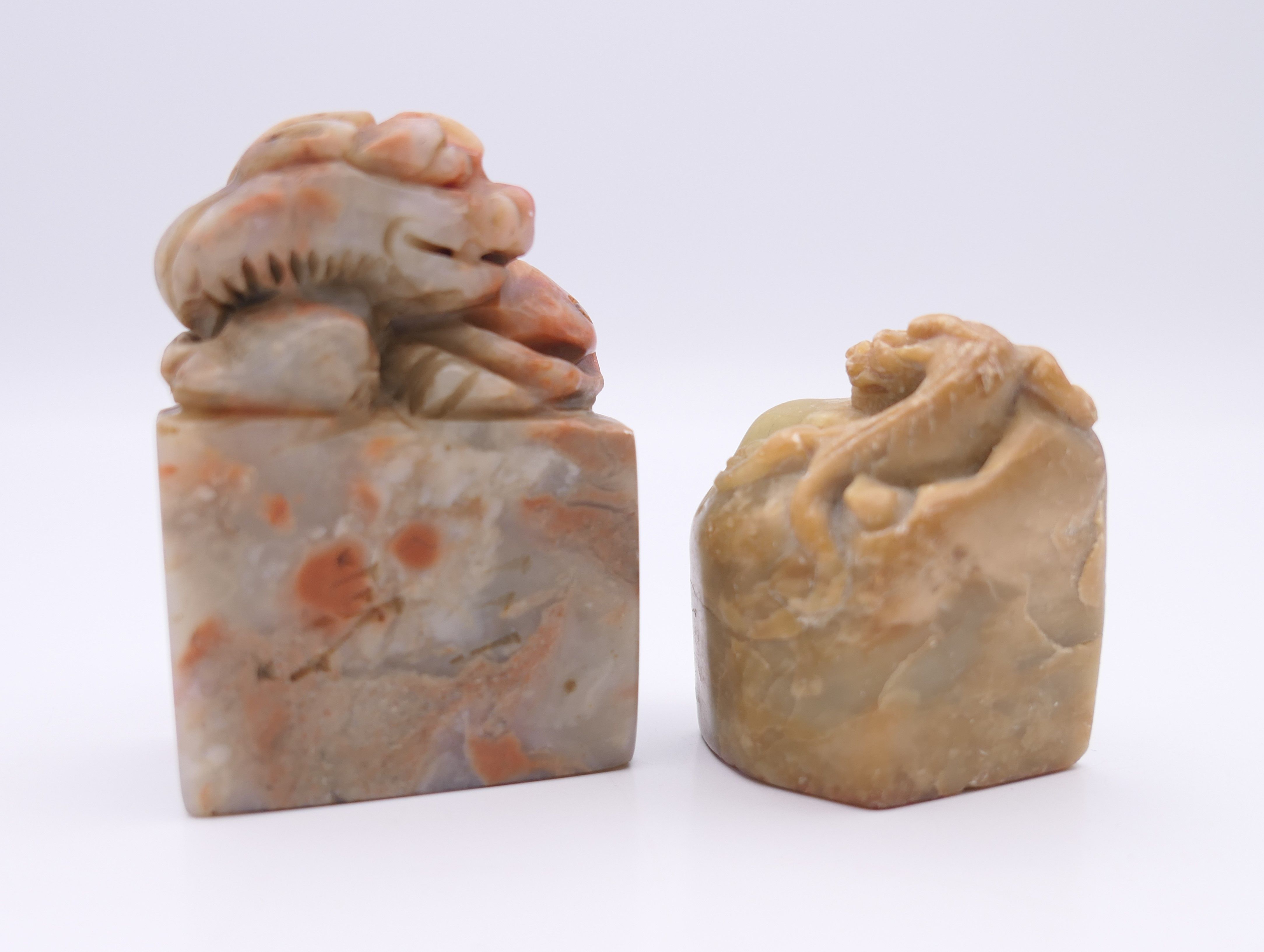 Two small Chinese carved stone seals, Qing Dynasty. The largest 5 cm high.