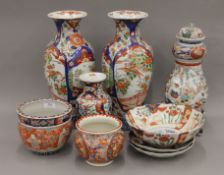A quantity of 19th century Japanese Imari porcelain, including vases, jardiniere's, dishes, etc.