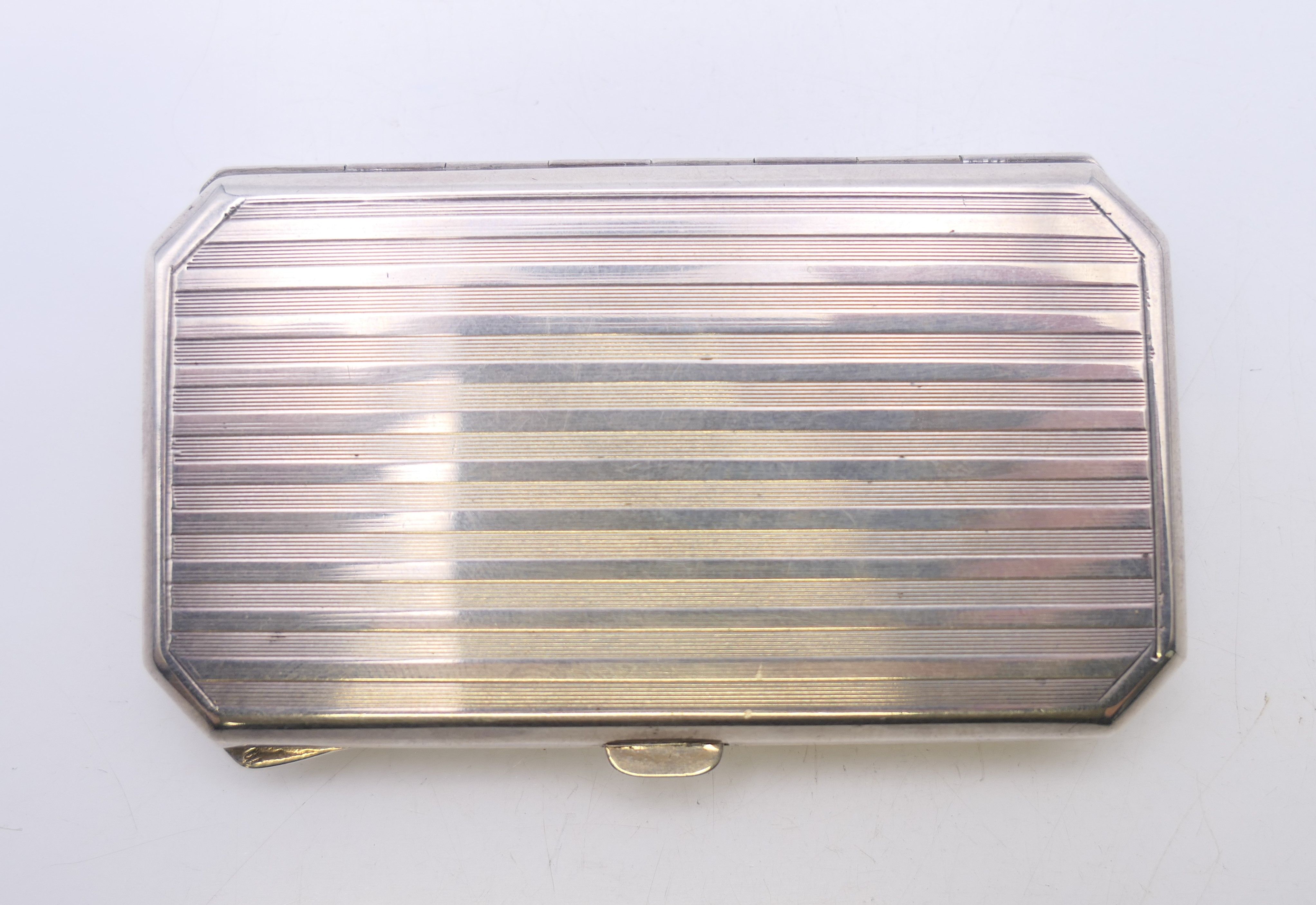 An early 20th century enamel decorated silver cigarette case. 8 cm x 4.5 cm. - Image 8 of 9