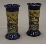 A pair of Royal Doulton stoneware vases. 15 cm high.
