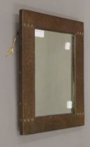 An Arts and Crafts beaten copper mirror. 28 x 38 cm.