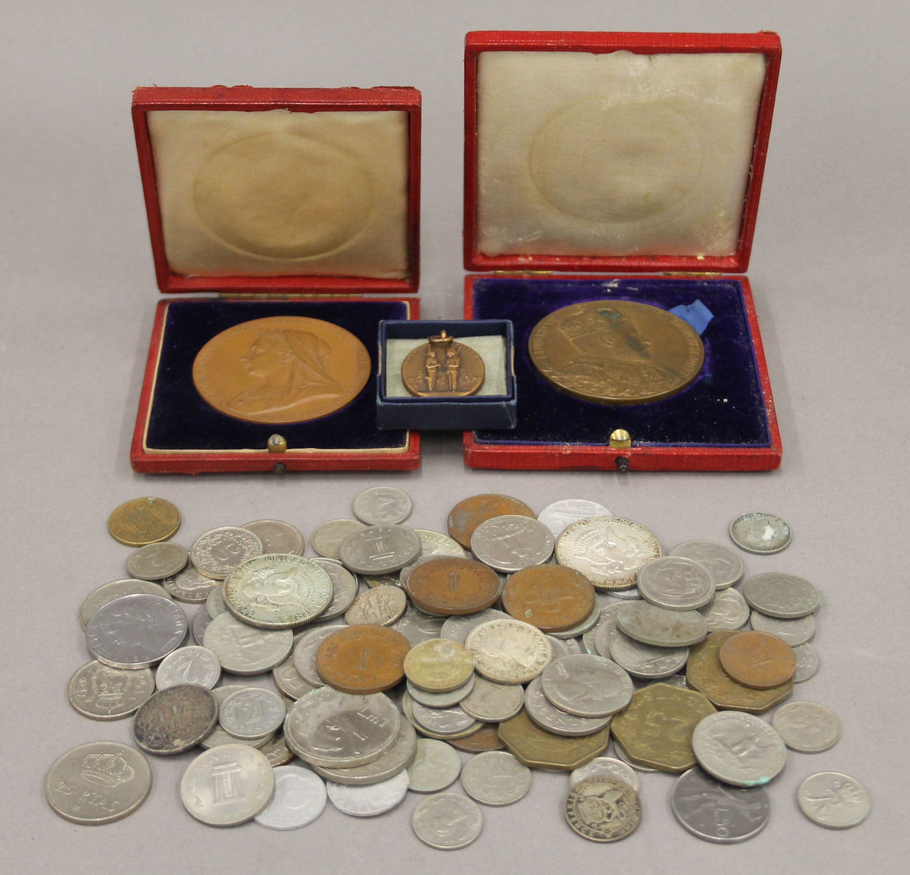 A quantity of various coins and medallions.