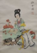A Japanese Lady, fabric picture, framed and glazed. 24.5 x 34.5 cm.