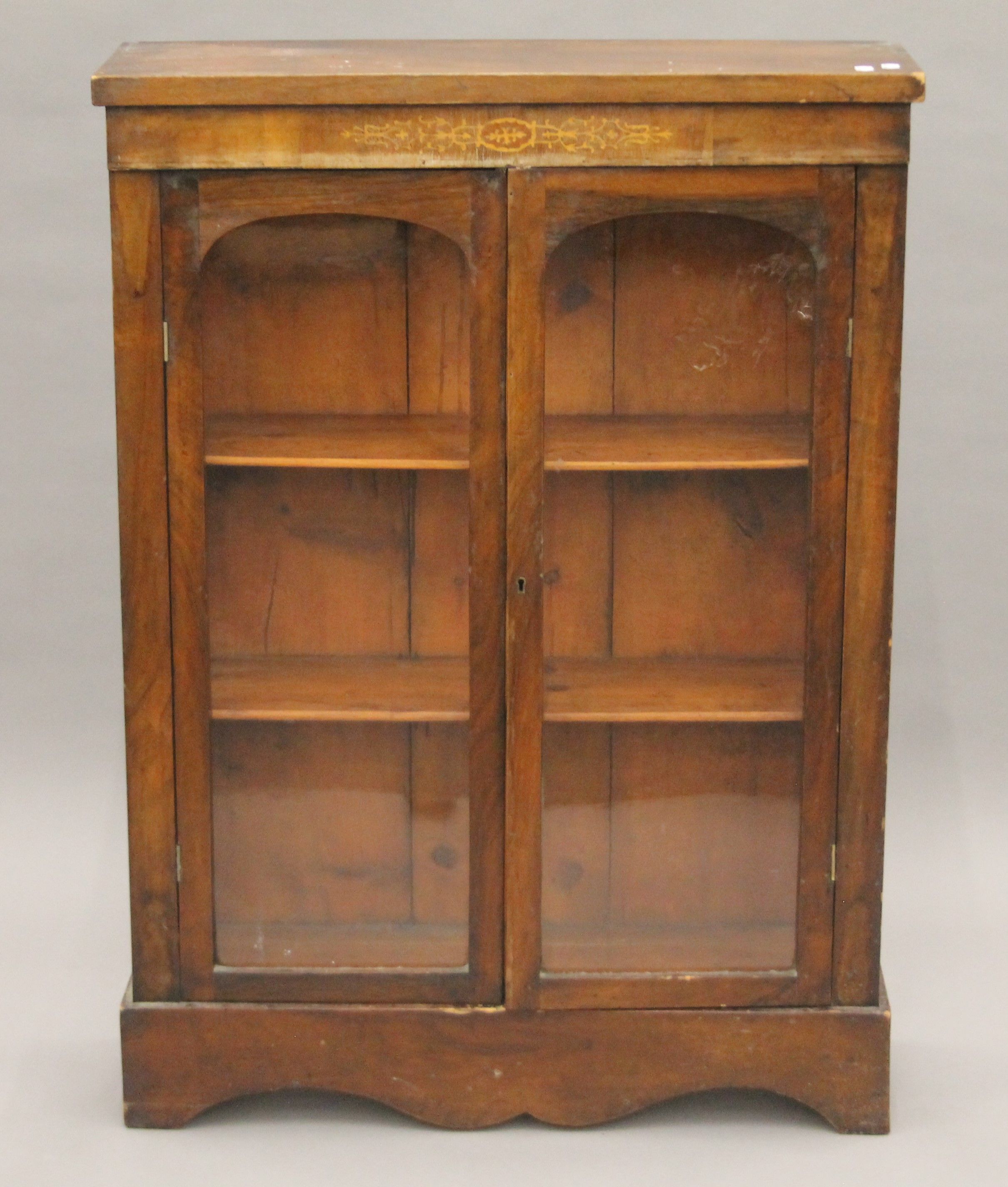 A Victorian inlaid walnut pier cabinet. 79.5 cm wide.