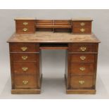 A Victorian walnut desk. 123 cm wide.