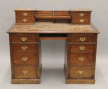 A Victorian walnut desk. 123 cm wide.