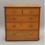 A Victorian walnut chest of drawers. 104.5 cm wide.