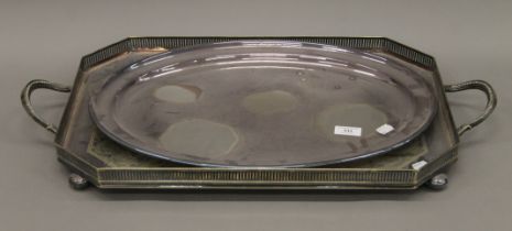 Two large silver plated trays. The largest 70 cm long.