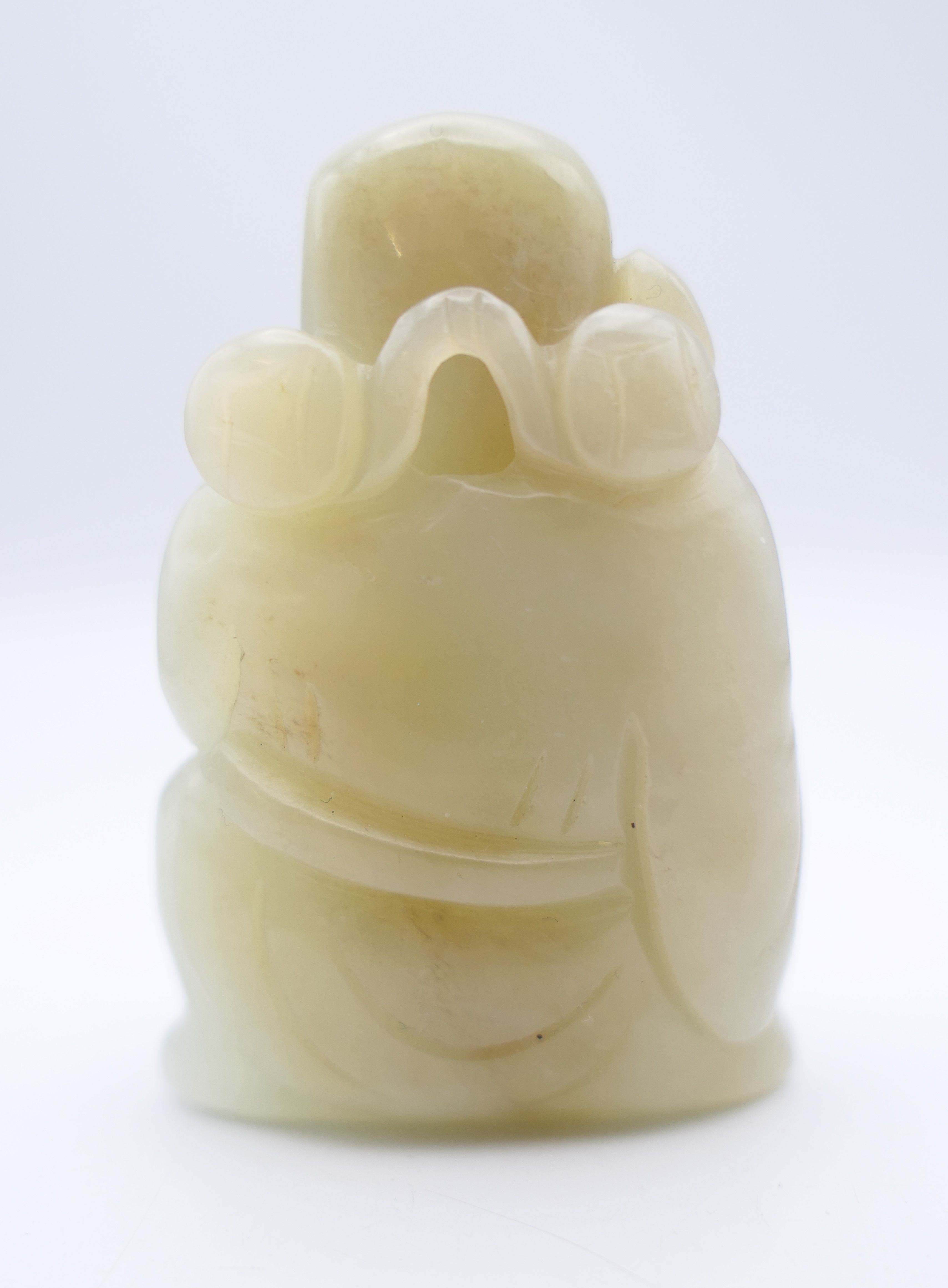 A Chinese light green jade carved figure of an old man, Qing Dynasty. 5.5 cm high. - Image 2 of 5