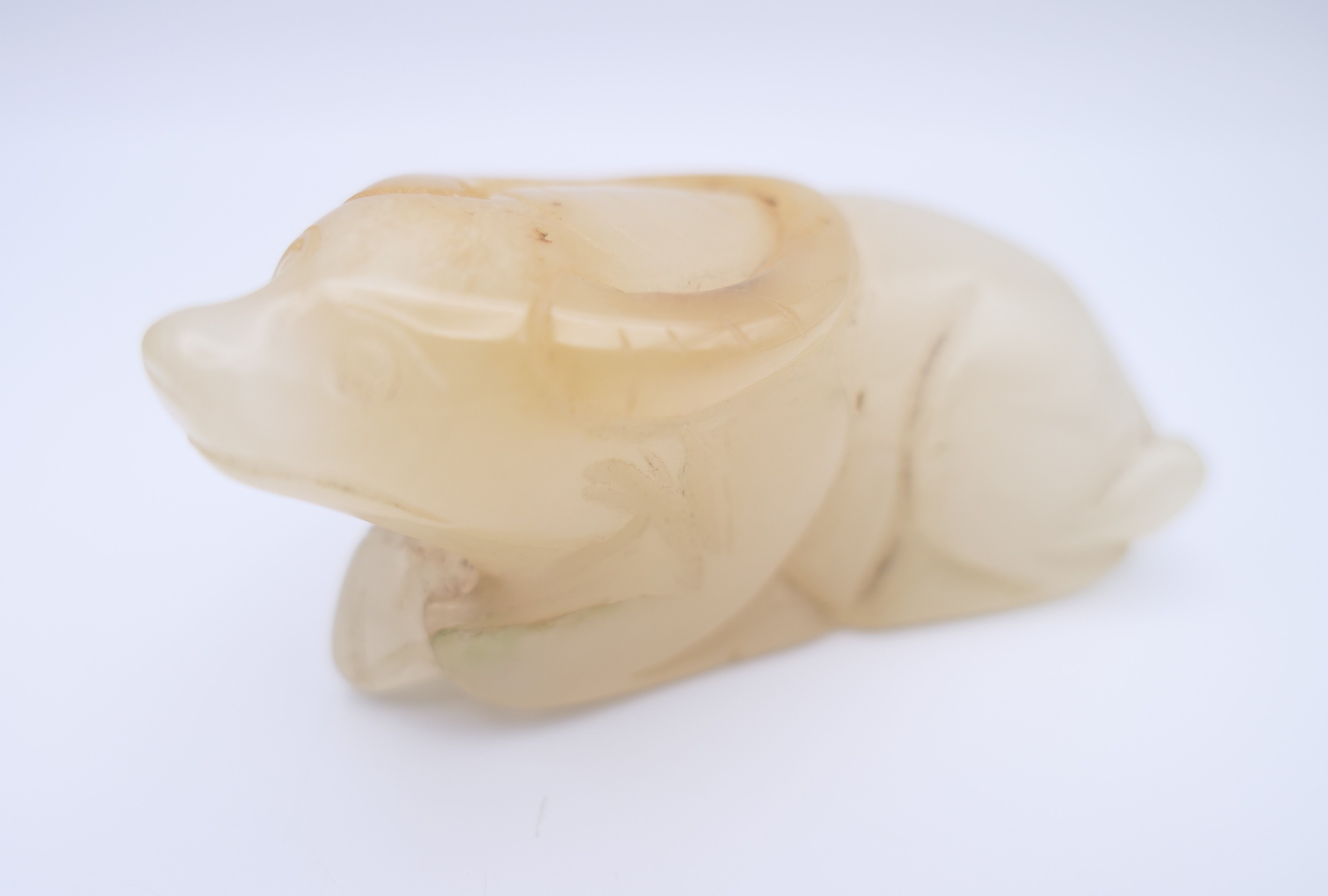 A Chinese white jade recumbent water buffalo, late Qing Dynasty or after. 7 cm long. - Image 6 of 6